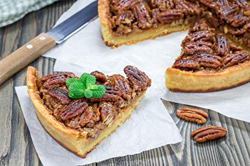 A pecan cake on the grey ground one piece extracted by Anna and Sarah